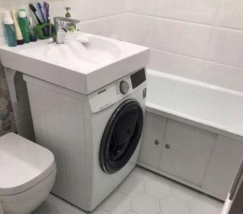 Умело спрячьте стиральную машину в ванной комнате
